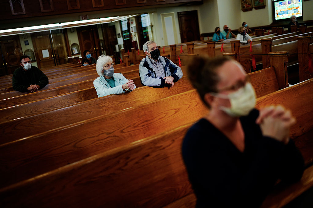 Lynne and Tom Coudron pray